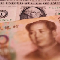 Китайским госбанкам приказано снизить ставки на депозиты в долларах