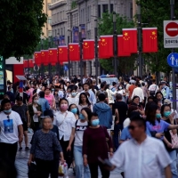 Медленная потребительская инфляция и углубляющаяся дефляция в Китае испытывают политику страны